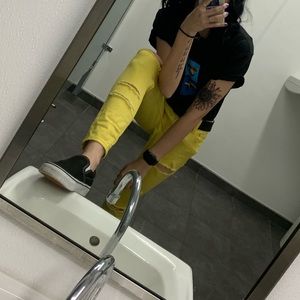 Yellow ripped jeans